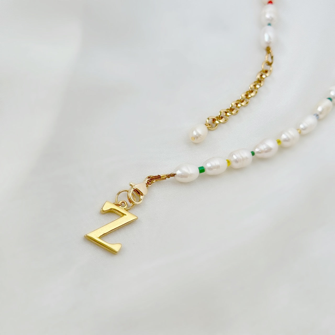 Golden Initial Charm