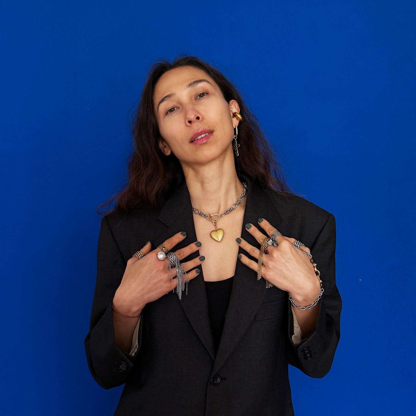 Silver Necklace With A Golden Heart