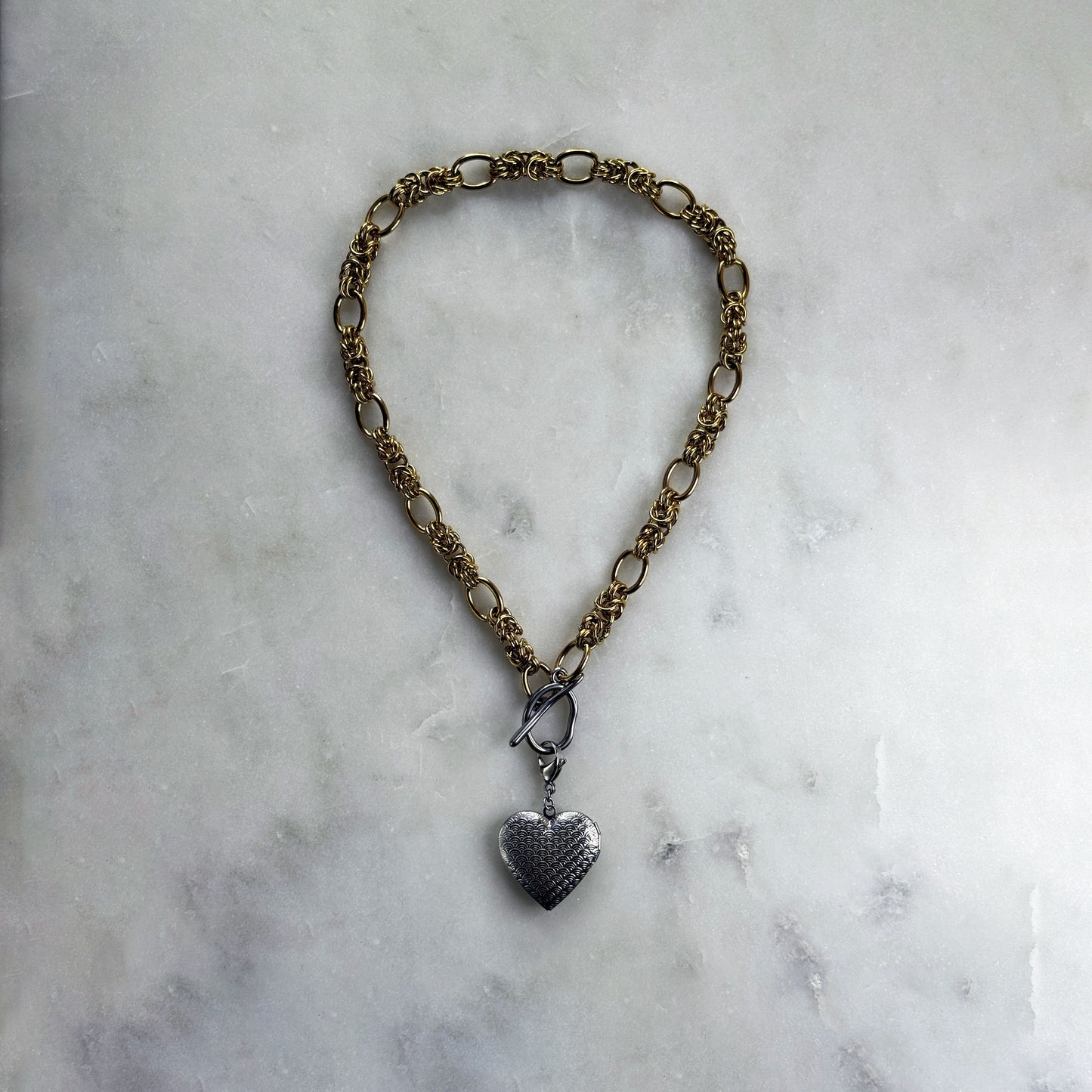 Bicolor Necklace With A Medallion In Silver