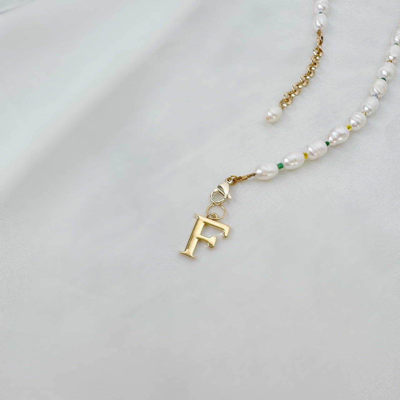 Golden Initial Charm