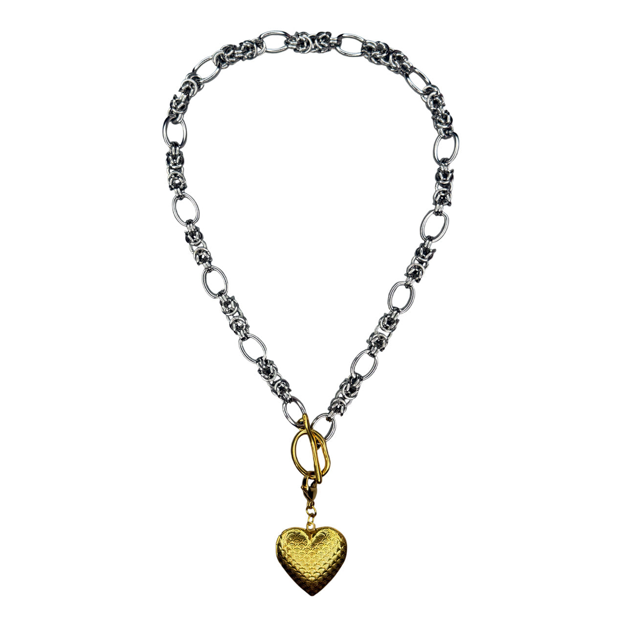 Silver Necklace With A Golden Heart