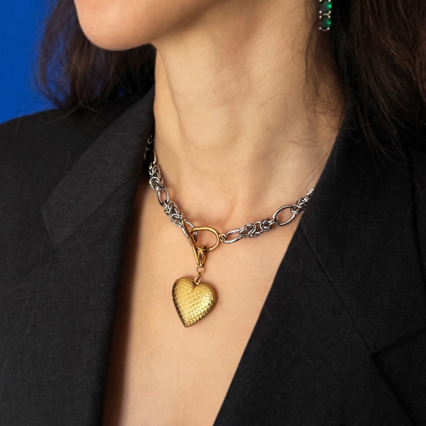 Silver Necklace With A Golden Heart