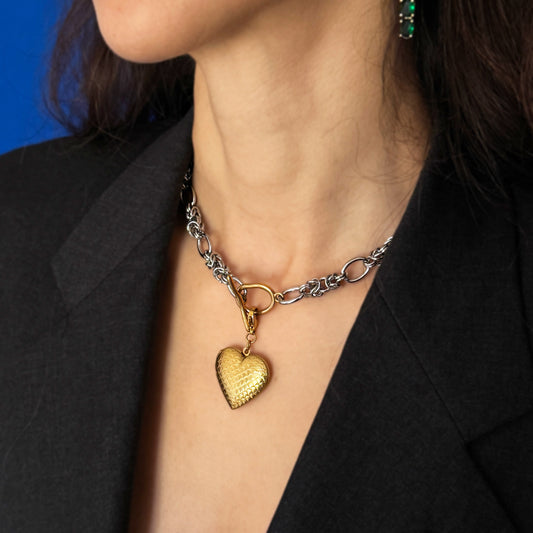 Silver Necklace With A Golden Heart